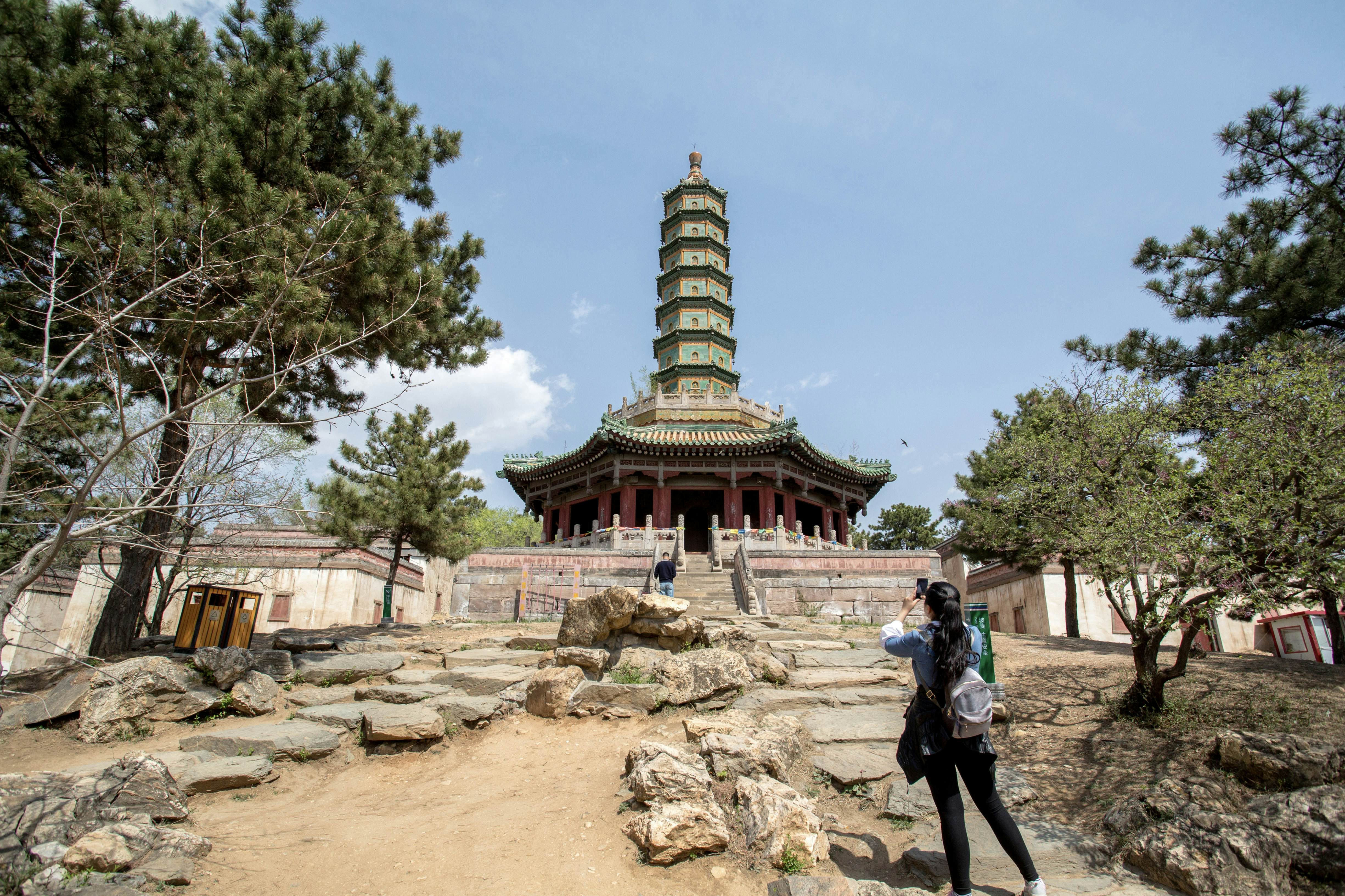 CHENGDE, HEBEI PROVINCE, CHINA - 2015/04/23: Seven-story octagonal Liuli-Wanshou pagoda (Glazed Tile Pagoda of Longevity).  The Xumi Fushou Temple (Temple of  Sumeru Happiness and Longevity) is one of the Eight Outer Temples in Chengde,  which are listed as the World cultural sites along with Chengde Mountain Resort.  The temple was first designed in 1780 to celebrate the 70th Birthday of Emperor Qianlong and built for Penchen Lama the VI. (Photo by Zhang Peng/LightRocket via Getty Images)
471431506
Xumi Fushou Temple, Temple of  Sumeru Happiness and Longevity, Eight Outer Temples, Chengde, World Heritage site, Mountain Resort, temple, Chinese, China, Tibetan, architecture, religion, belief, Buddhist, Buddhism, historic, imperial, relic, travel destination, tourist attraction, tourism, pagoda, glazed
